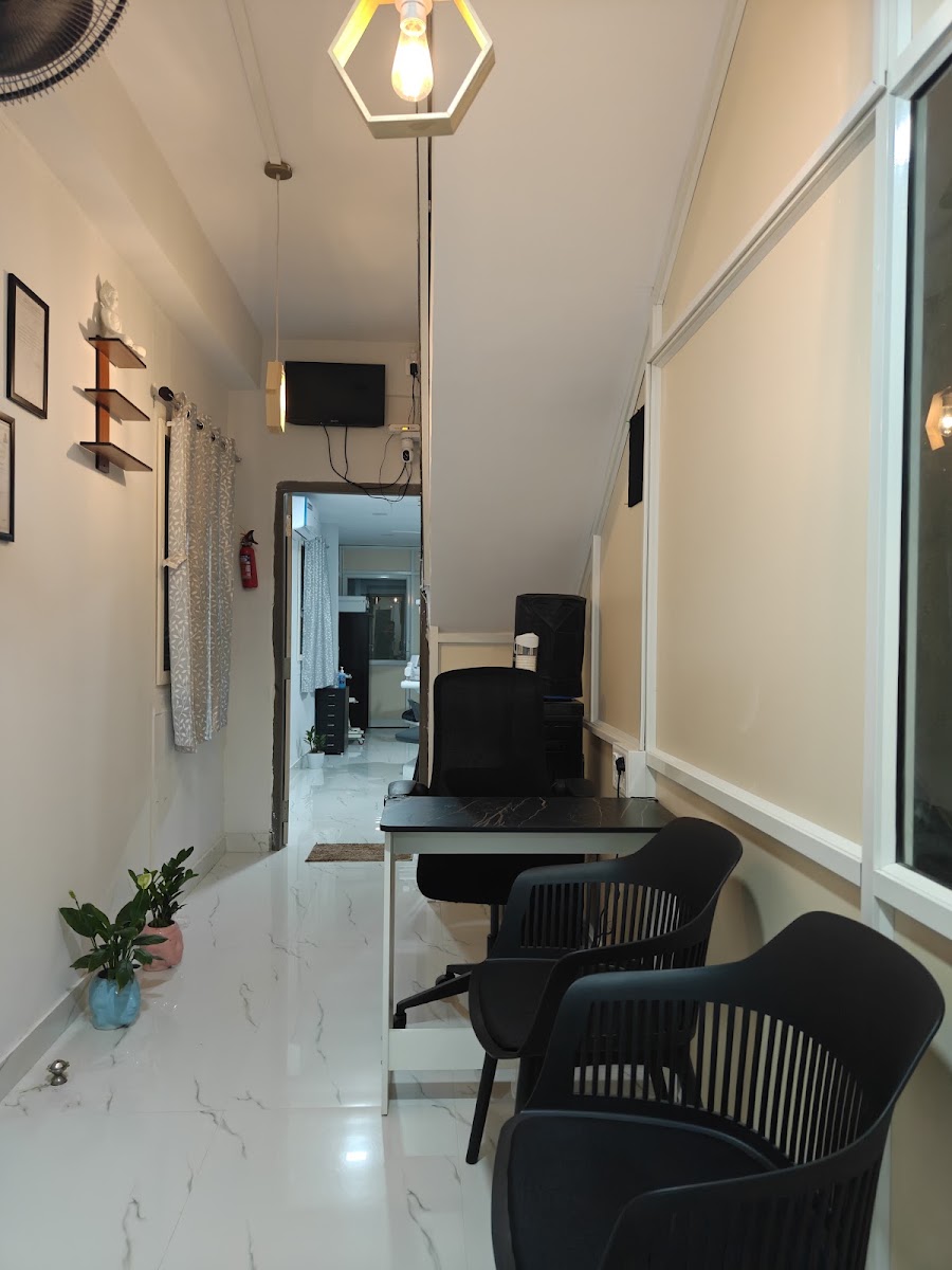 Real patient waiting lounge and consultation corridor at ORIS Speciality Dentistry